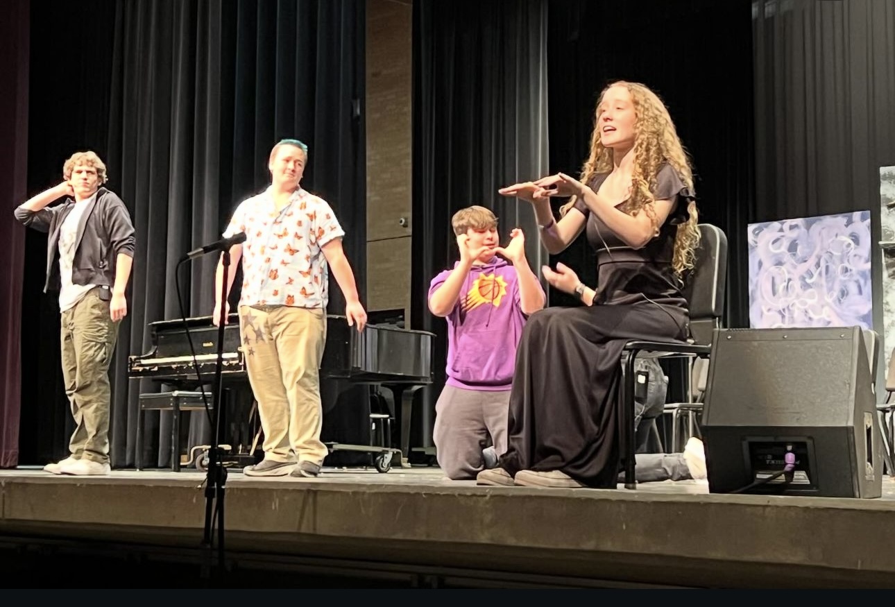 Theater students perform on stage