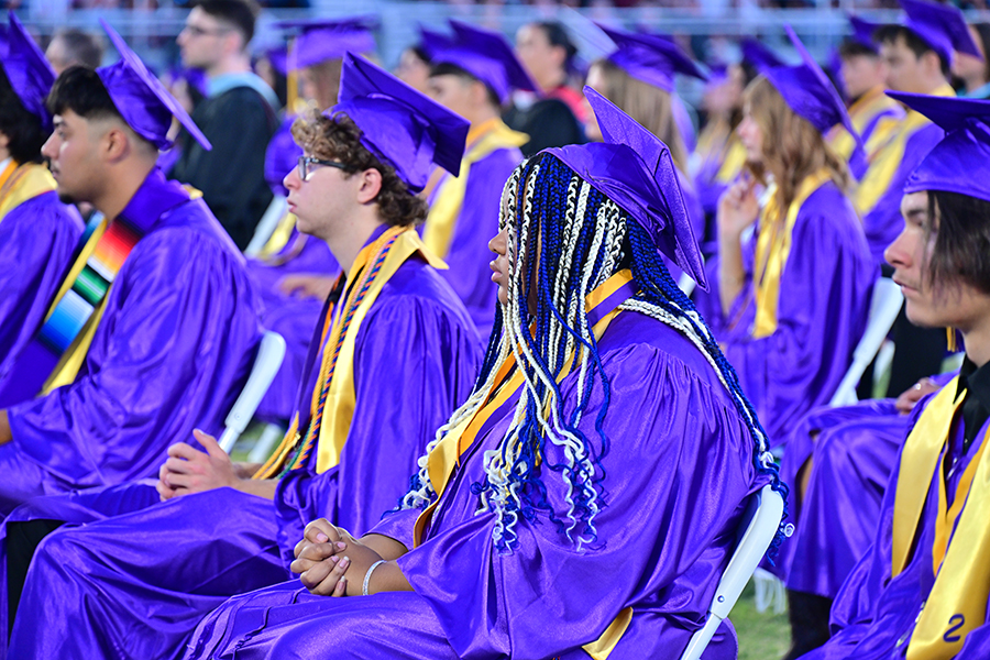 Graduating seniors watch the ceremony