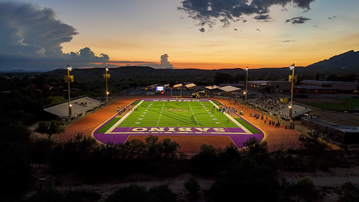 A drone view of the Sabino football field at sunset
