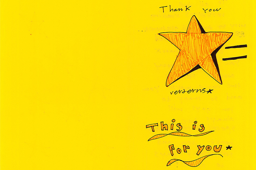 A yellow card with a star on it reading Thank You Veterans This is for you