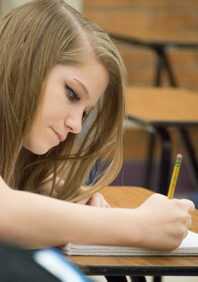 A Student Writes During Writing