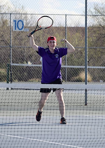Student celebrating during tennis match